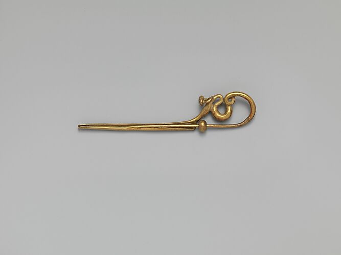 Gold serpentine fibula (safety pin)