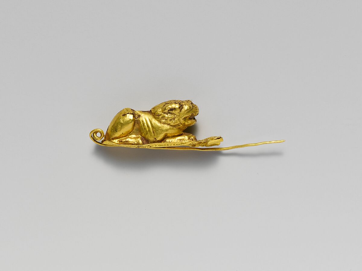 Gold fibula (safety pin) with recumbent lion, Gold, Etruscan 