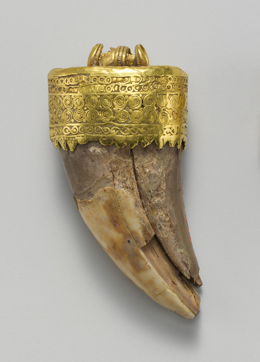 Tooth pendant set in gold, Gold, bone, Etruscan 
