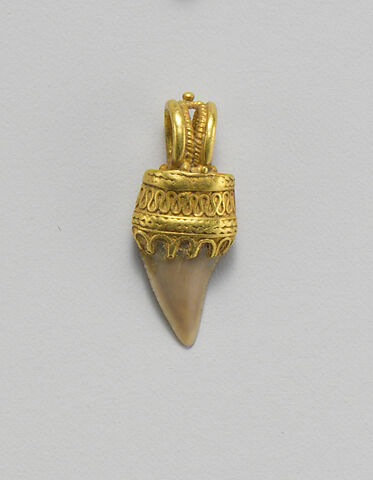 Tooth pendant set in gold, Gold, bone, Etruscan 