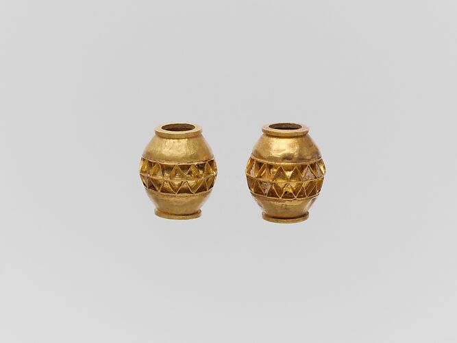Two gold beads