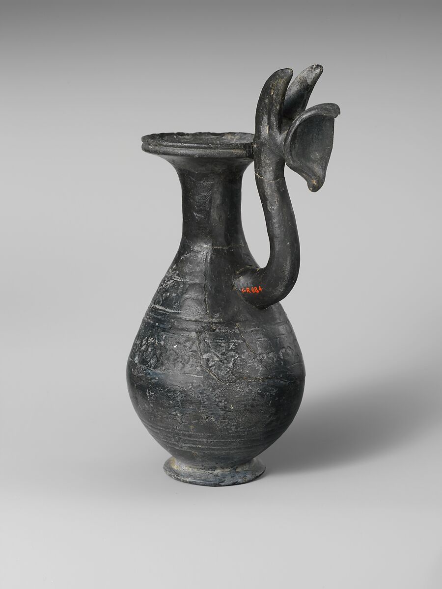 Terracotta jug with griffin protome handle, Terracotta, Etruscan 