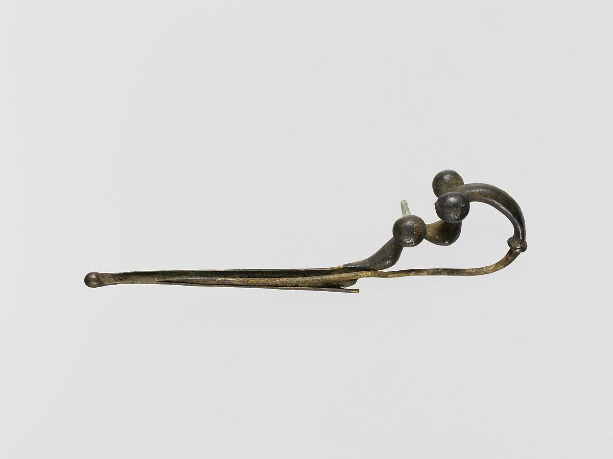 Bronze dragon-type fibula (safety pin), Bronze, Etruscan 