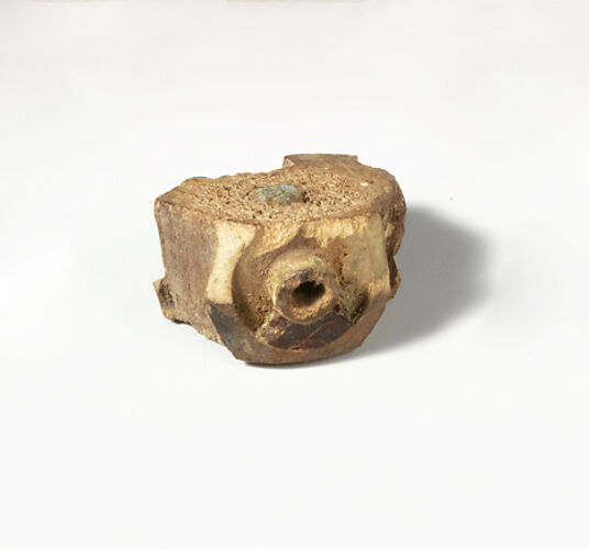 Bone and amber segment from a fibula (safety pin)