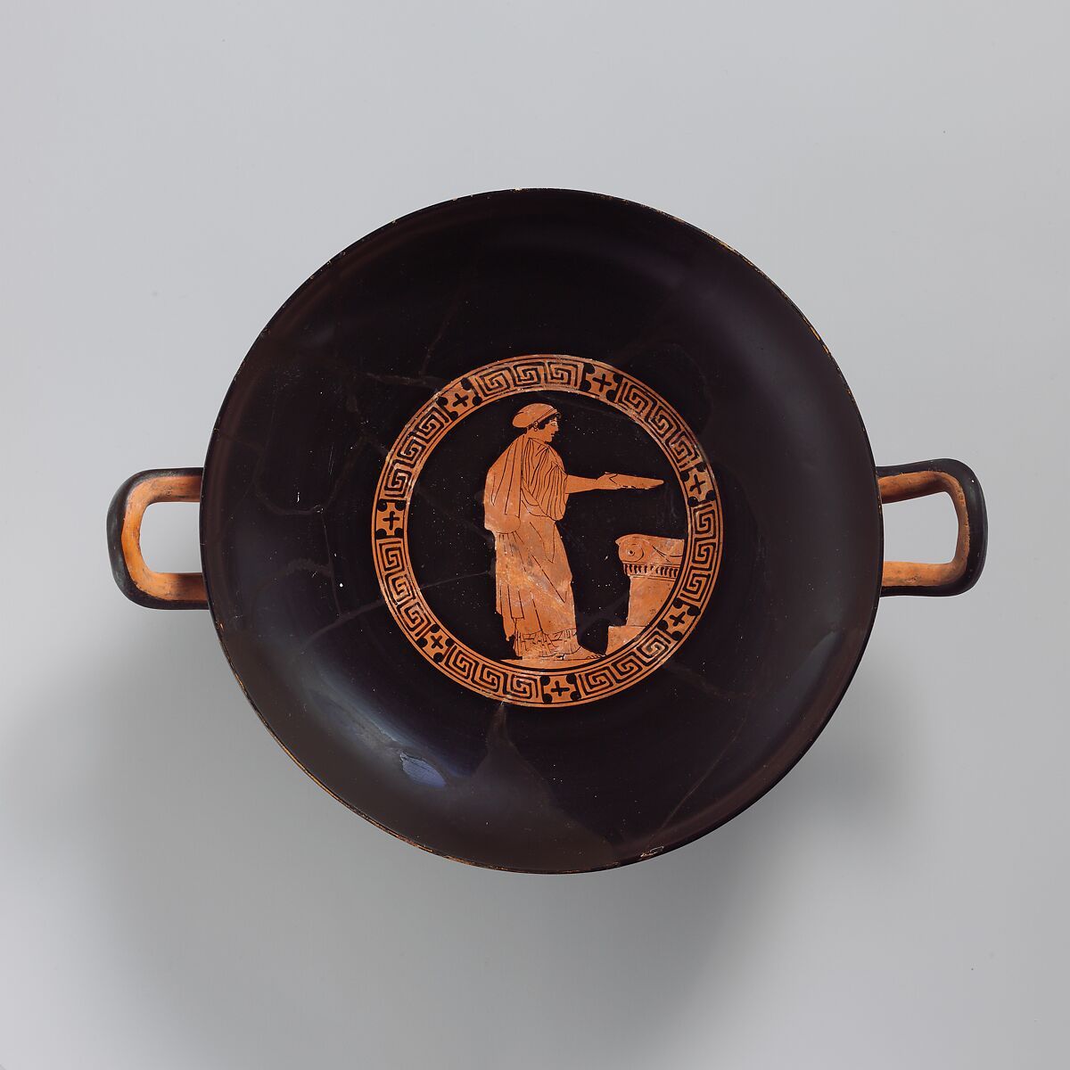 Terracotta kylix (drinking cup), Attributed to the Painter of London E 100, Terracotta, Greek, Attic 