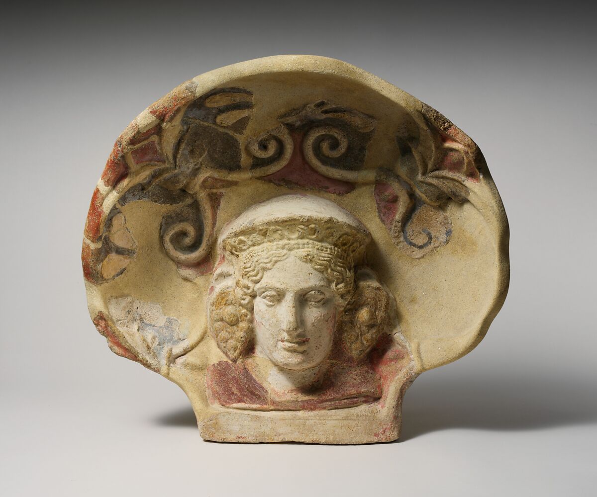 Terracotta antefix (roof tile) with head of a maenad, Terracotta, Etruscan, Cerveteri 