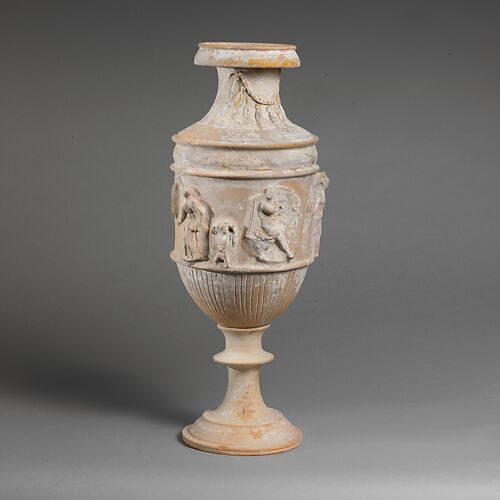 Terracotta vase with relief decoration