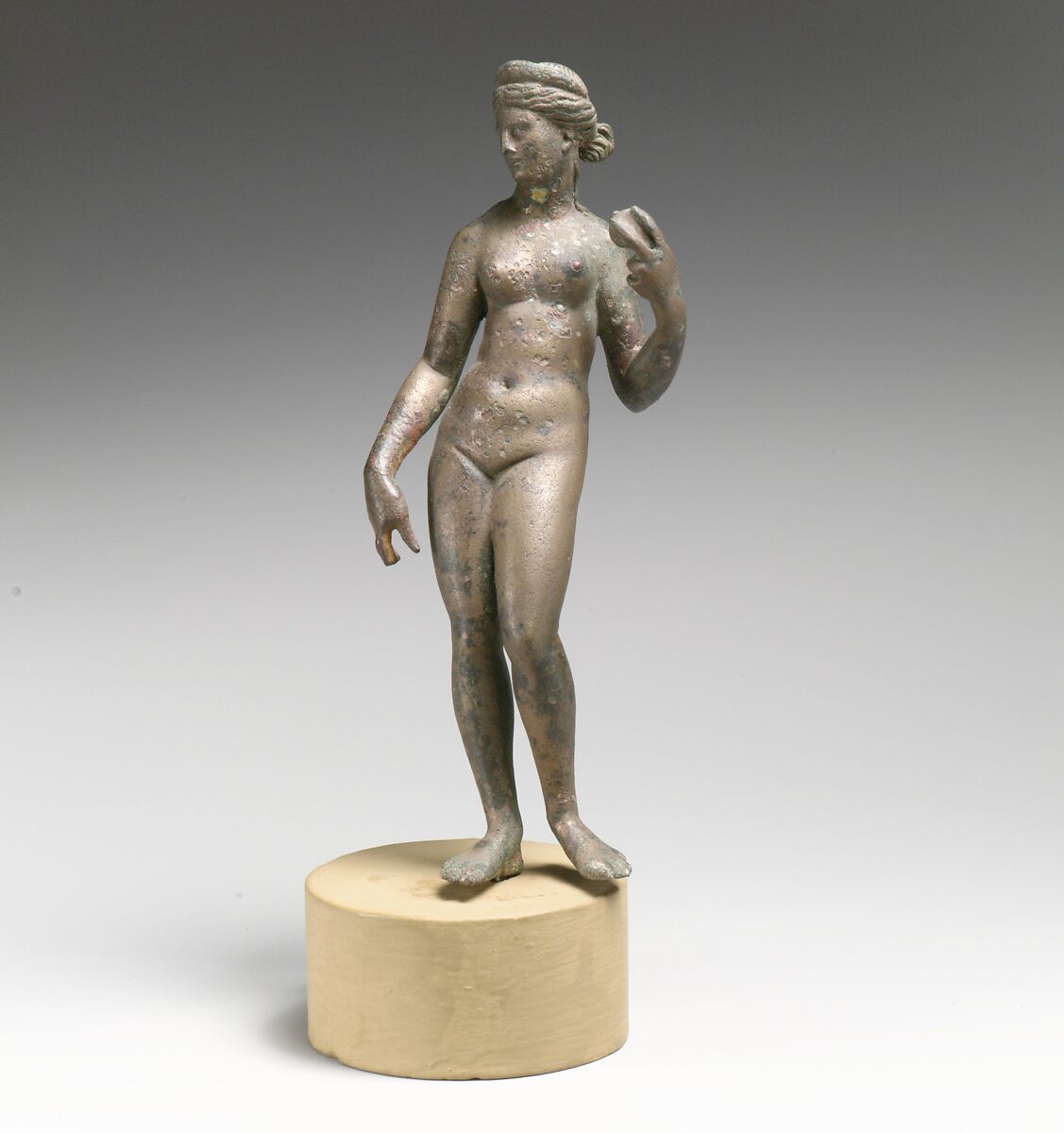 Statuette of Aphrodite with apple, Bronze, Roman 