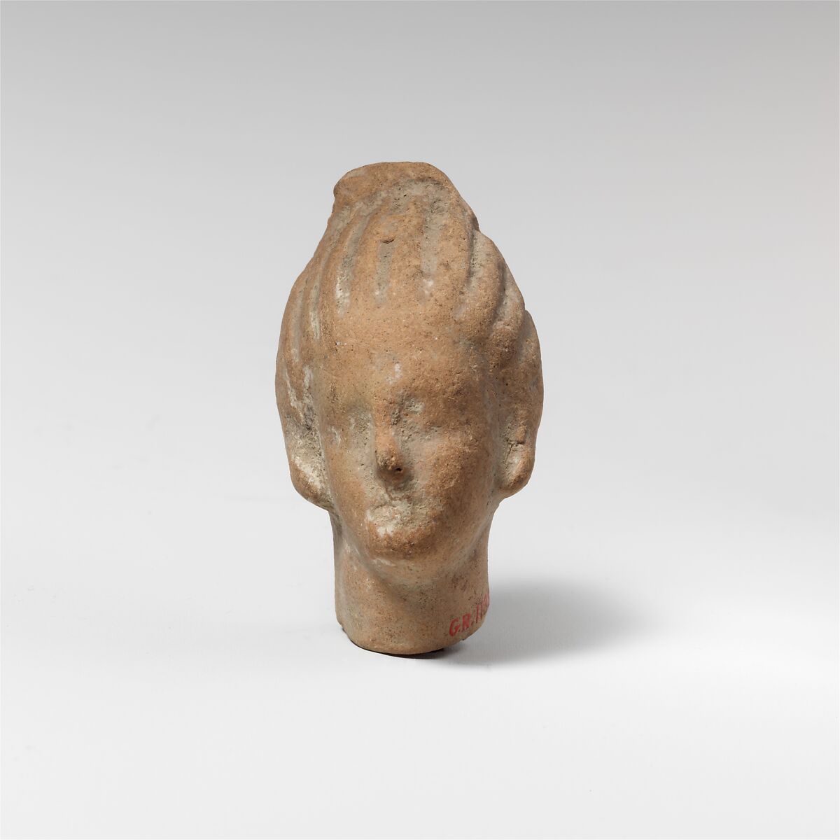 Terracotta head of a woman, Terracotta, Egyptian (?) 