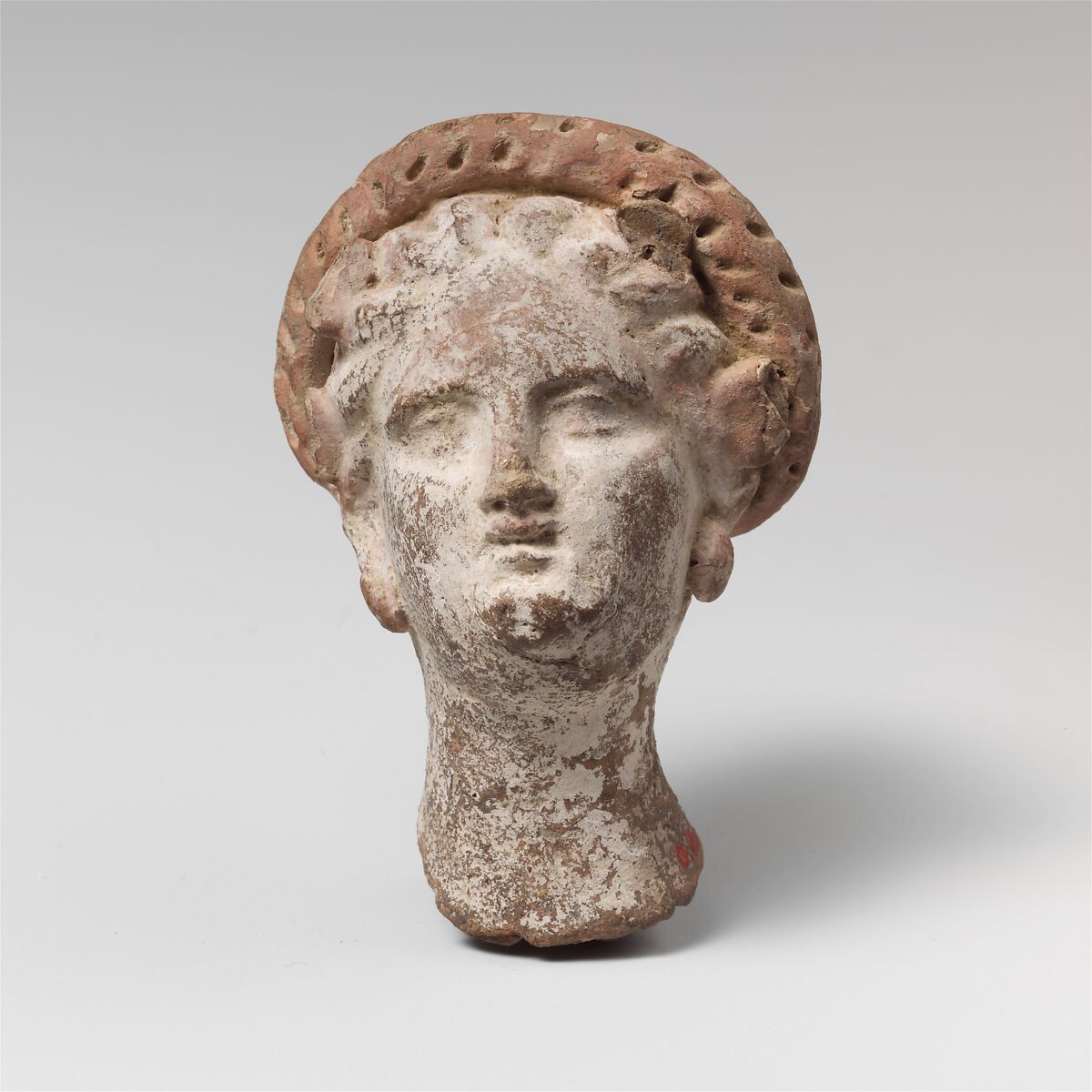 Terracotta head of a woman, Terracotta, Egyptian (?) 