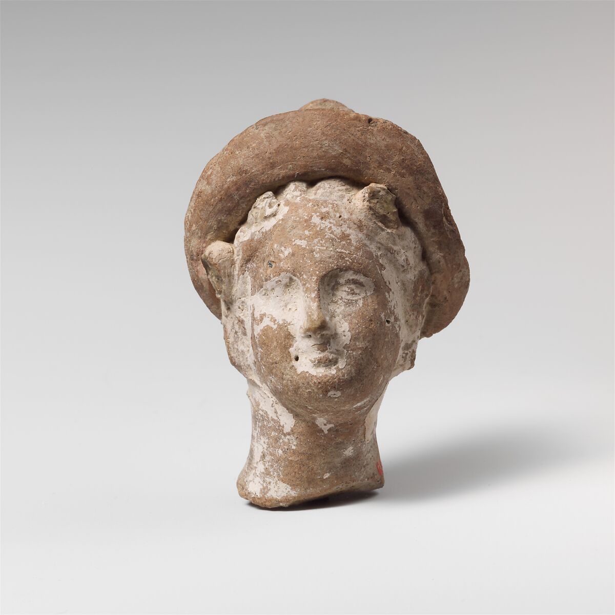 Terracotta head of a woman, Terracotta, Egyptian (?) 