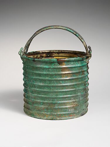 Bronze ribbed situla (bucket) with two handles