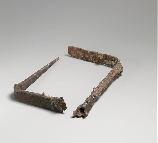 Two fragmentary iron fire-rakes
