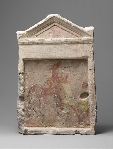 Painted limestone funerary slab with a man controlling a rearing horse