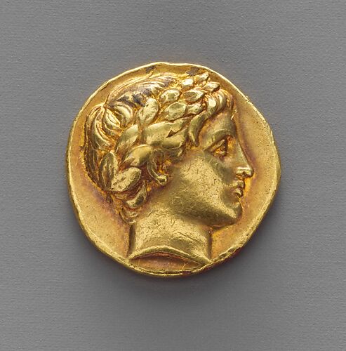 Ptolemy IV Philopator with radiant crown, gold octadrachm. Metropolitan