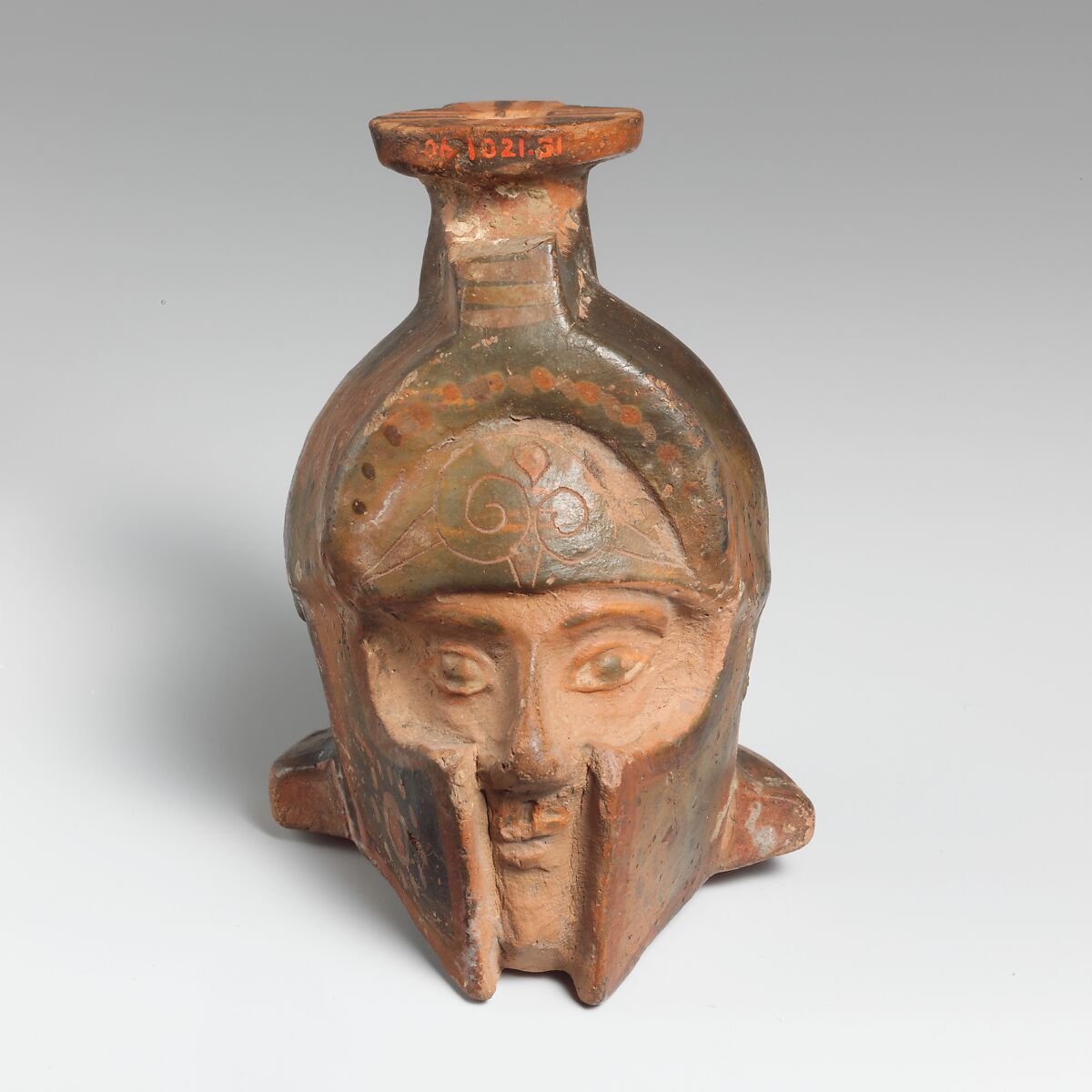 Aryballos (perfume flask) in the form of a helmeted head, Terracotta, East Greek 