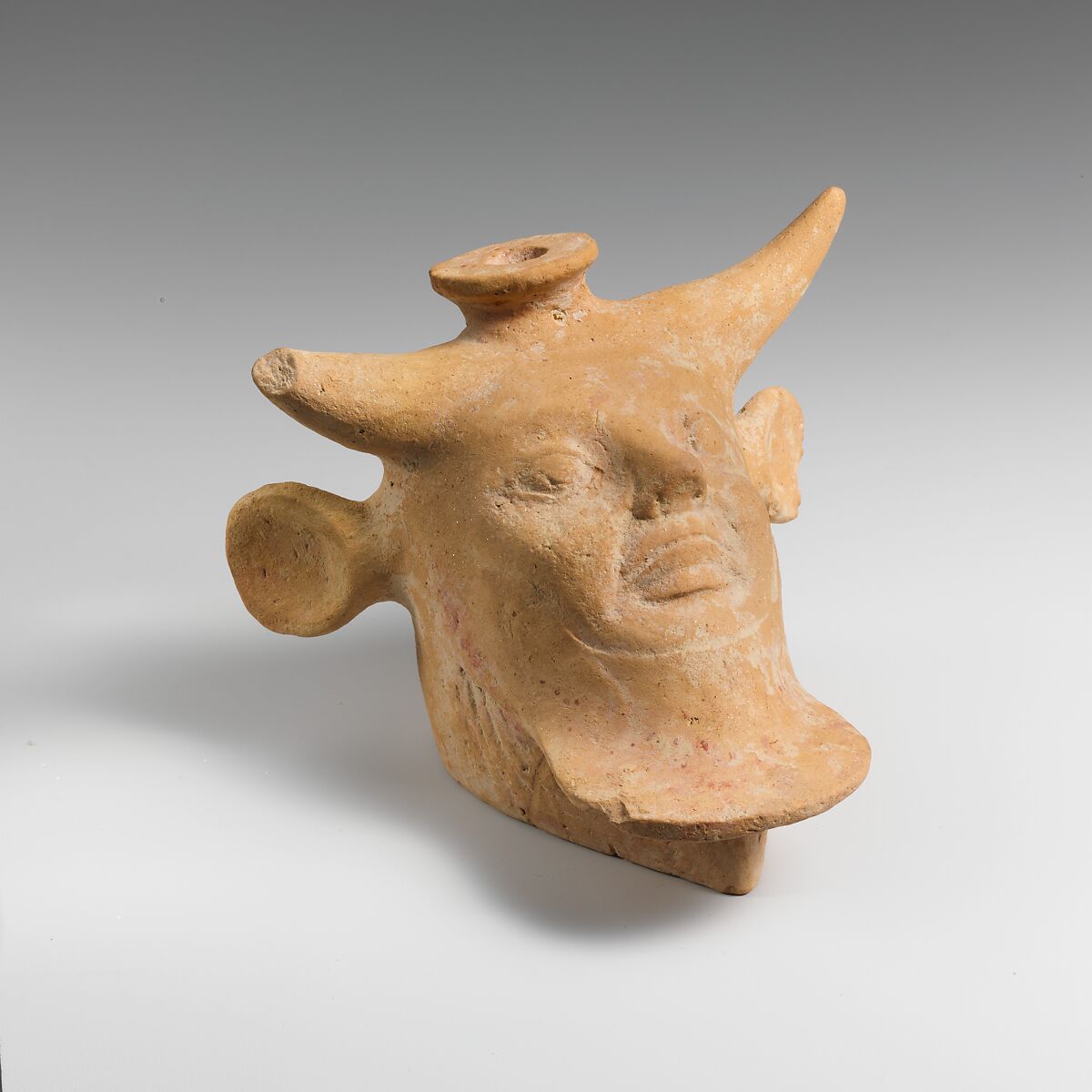 Vase in the form of a head of Acheloos, Terracotta, East Greek 