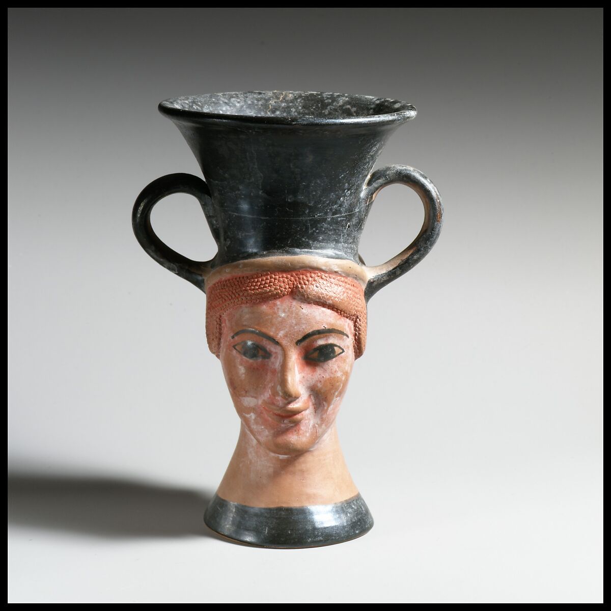 Kantharos in the form of two heads, Terracotta, Greek, South Italian, Campanian 