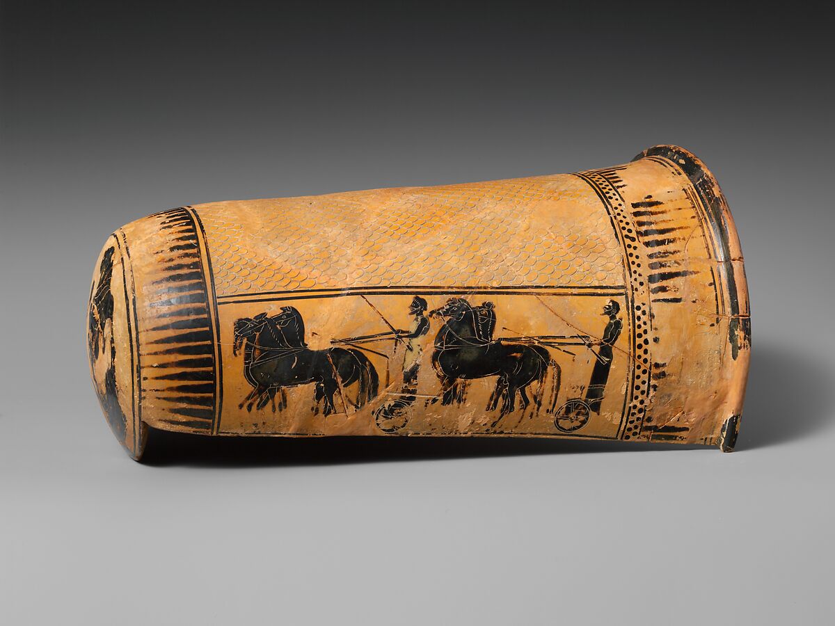 Terracotta onos (leg guard used in carding wool), Terracotta, Greek, Attic