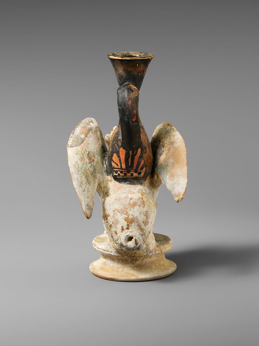Terracotta lekythos (oil flask) in the form of a sphinx, Terracotta, Greek, Attic