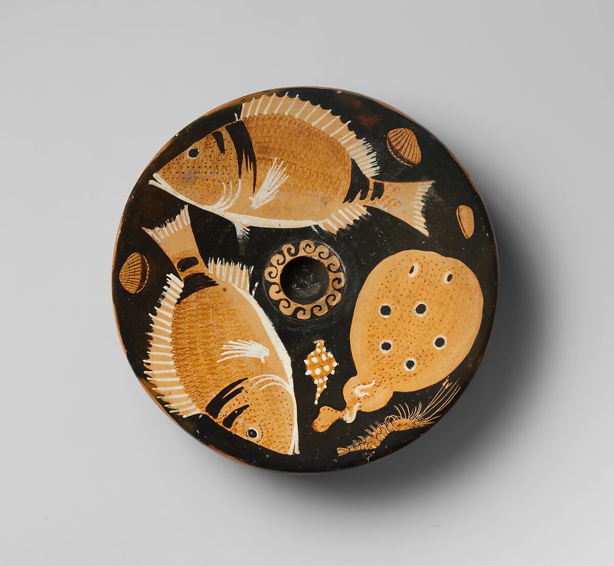 Terracotta fish-plate, Attributed to the Helgoland Painter, Terracotta, Greek, South Italian, Campanian 