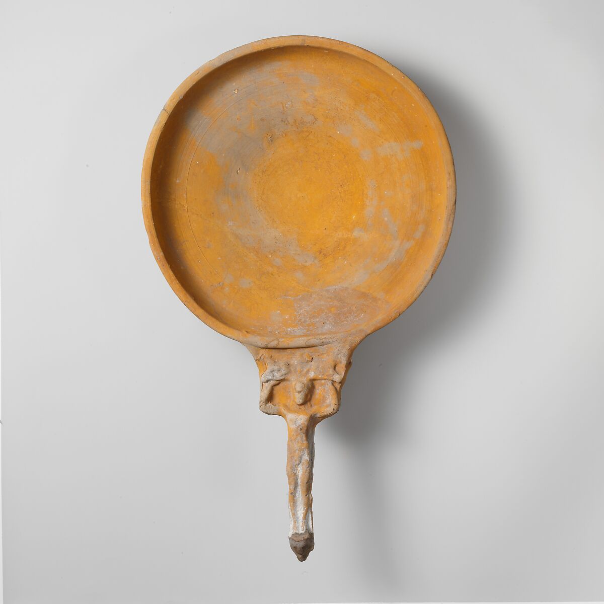 Terracotta patera (shallow bowl with handle), Terracotta, Greek, South Italian, Apulian 
