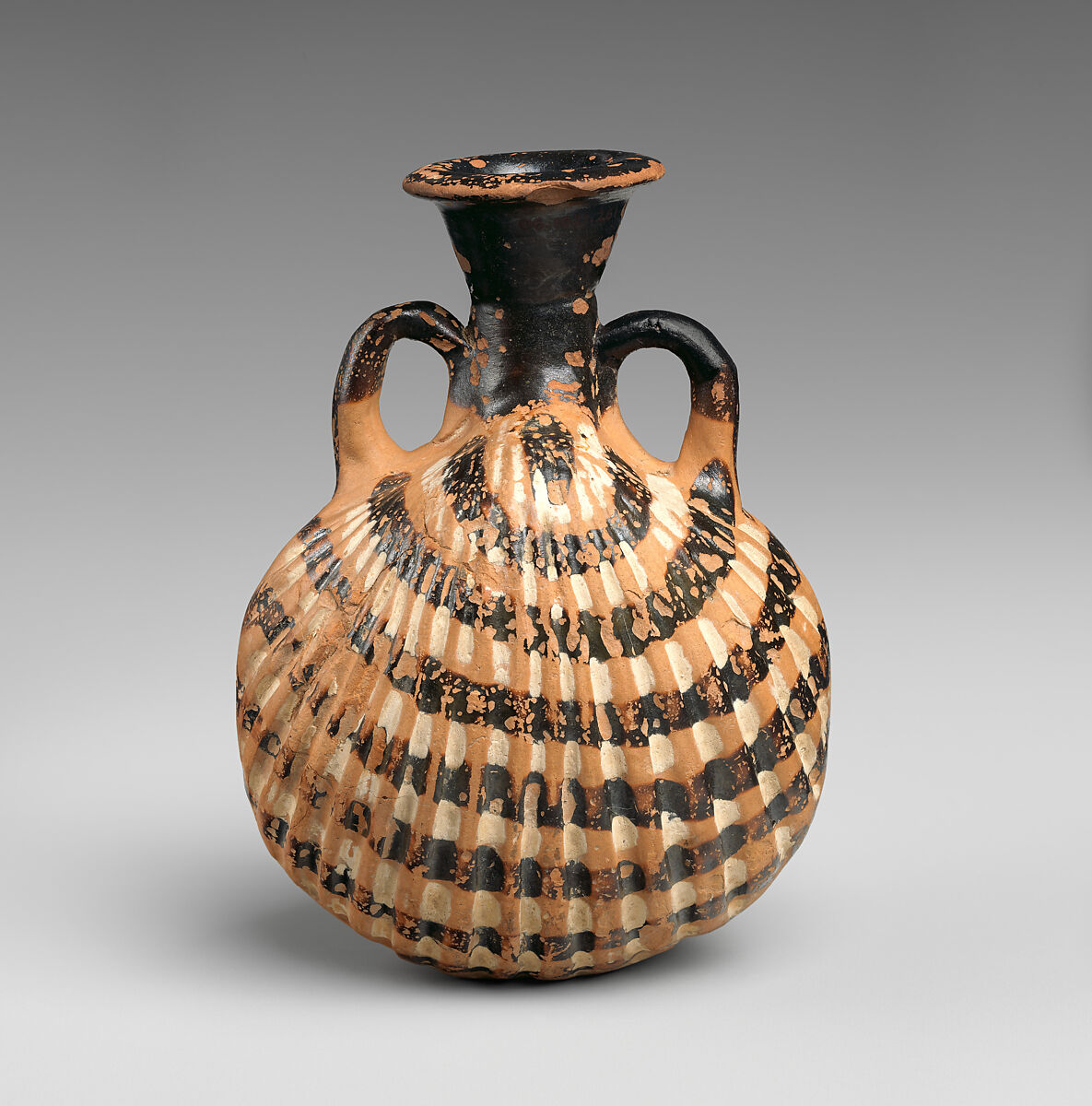 Terracotta amphoriskos (flask) in the form of a shell, Terracotta, Greek, Attic 