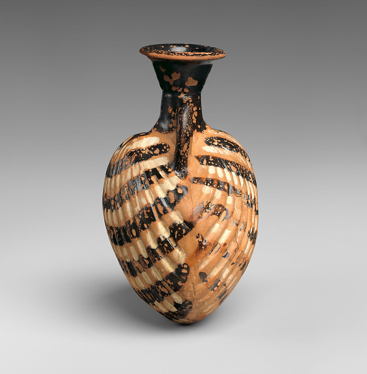 Terracotta amphoriskos (flask) in the form of a shell, Terracotta, Greek, Attic