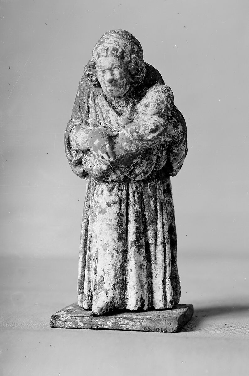 Terracotta statuette of a nurse carrying a child, Terracotta, Greek, possibly Attic 
