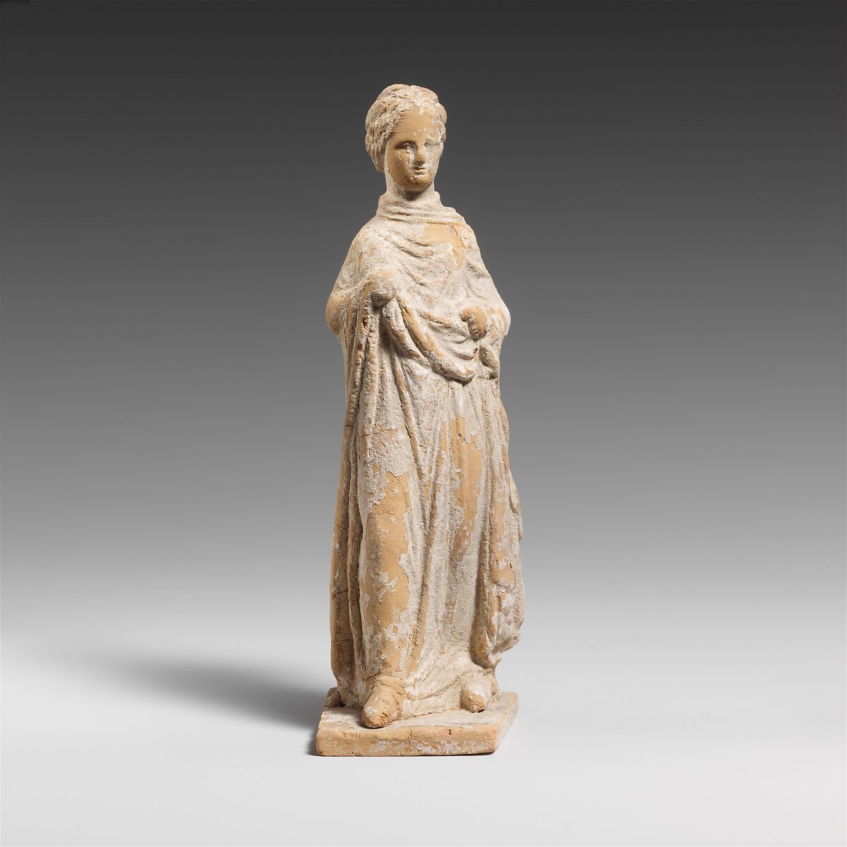 Terracotta statuette of a draped  woman, Terracotta, Greek, Attic 