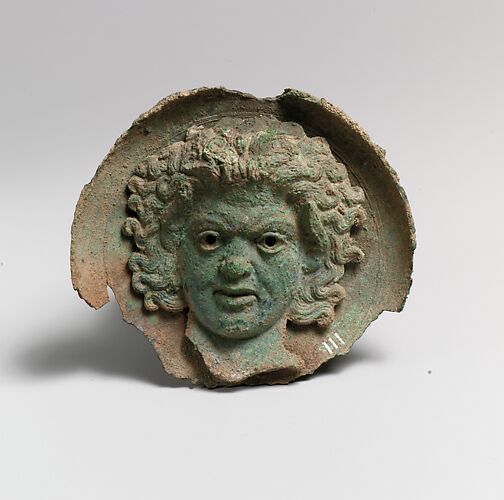 Silvered bronze roundel with satyr head (one of a pair)