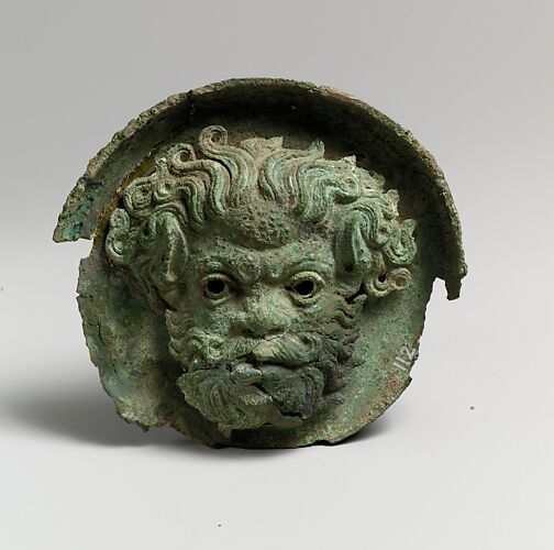 Silvered bronze roundel with satyr head (one of a pair)