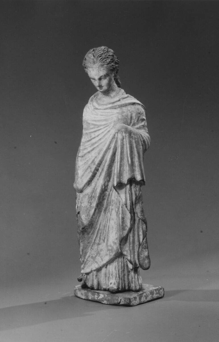Terracotta statuette of a woman, Terracotta, Greek, probably Attic 