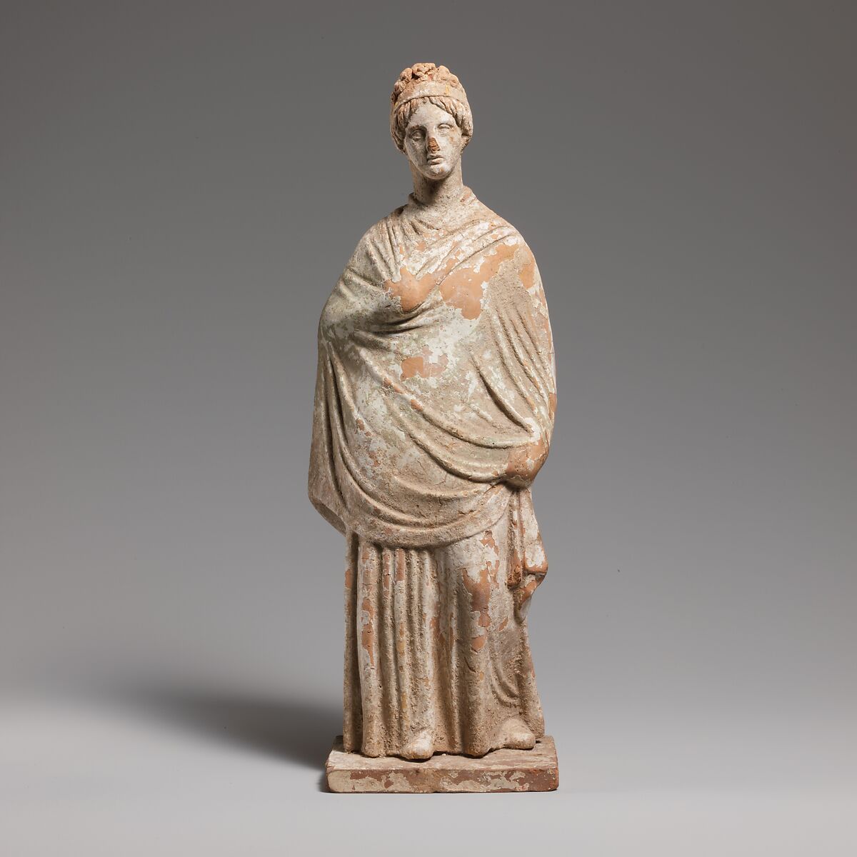 Terracotta statuette of a standing woman, Terracotta, Greek, Corinthian 
