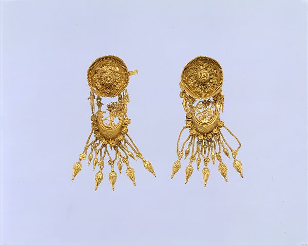 Pair of gold earrings with disk and boat-shaped pendant