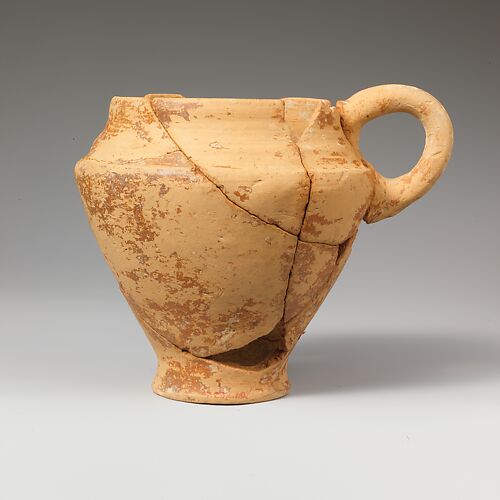 Terracotta carinated bridge-spouted jug