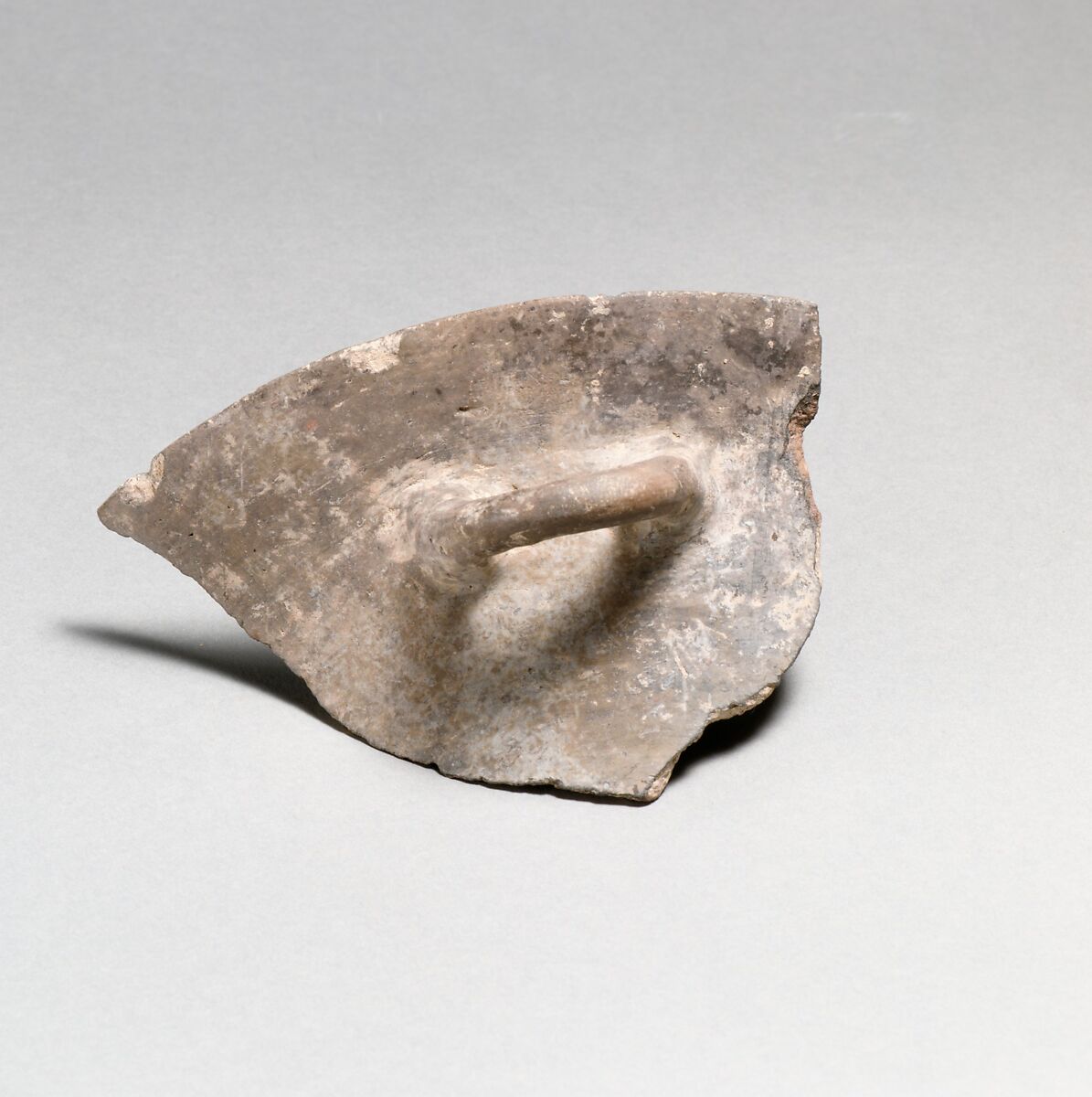 Terracotta rim, handle, and upper body of a bowl, Terracotta, Minoan 