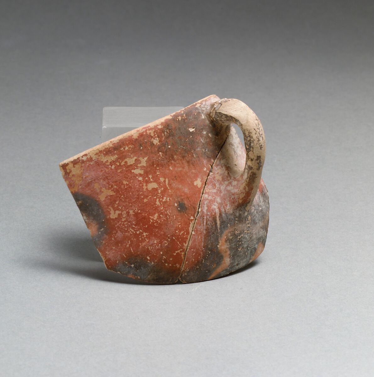 Terracotta rim, body and handle from a cup, Terracotta, Minoan 