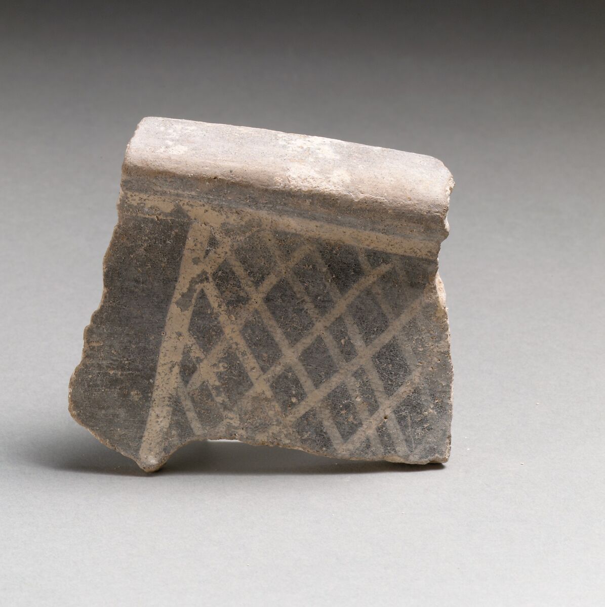 Terracotta rim fragment with cross-hatching, Terracotta, Minoan 