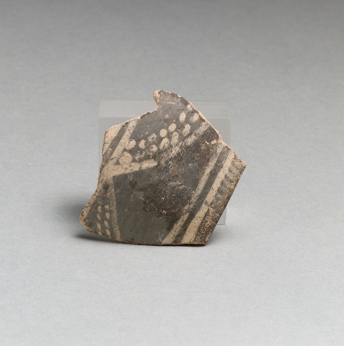 Terracotta rim fragment with bands and dots, Terracotta, Minoan 