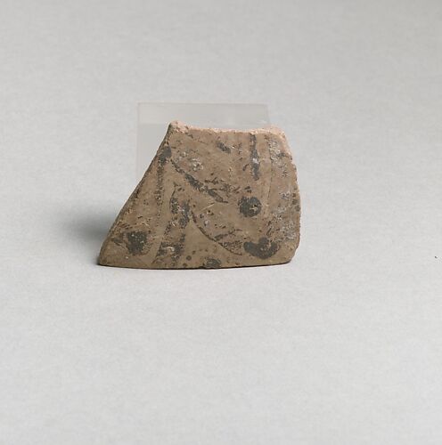 Terracotta vessel fragment with floral motif