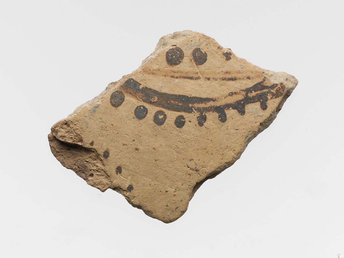 Terracotta vessel fragment with floral or marine motif, Terracotta, Minoan 