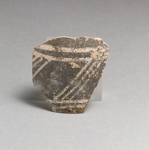 Terracotta rim fragment with triglyph and metope motif