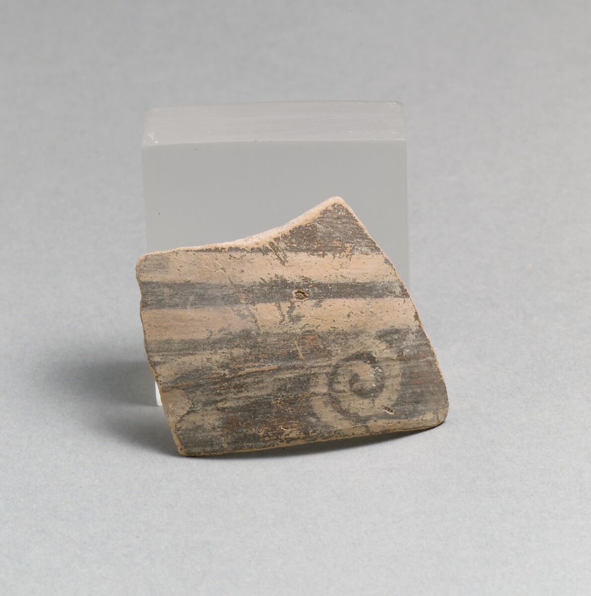 Terracotta rim fragment with running spiral, Terracotta, Minoan 