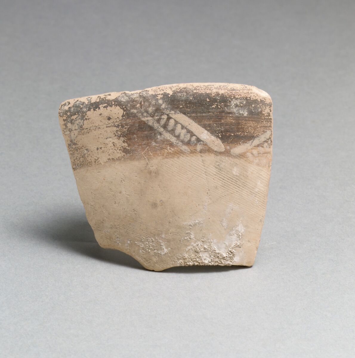 Terracotta rim fragment with diagonal lines and chevrons, Terracotta, Minoan 