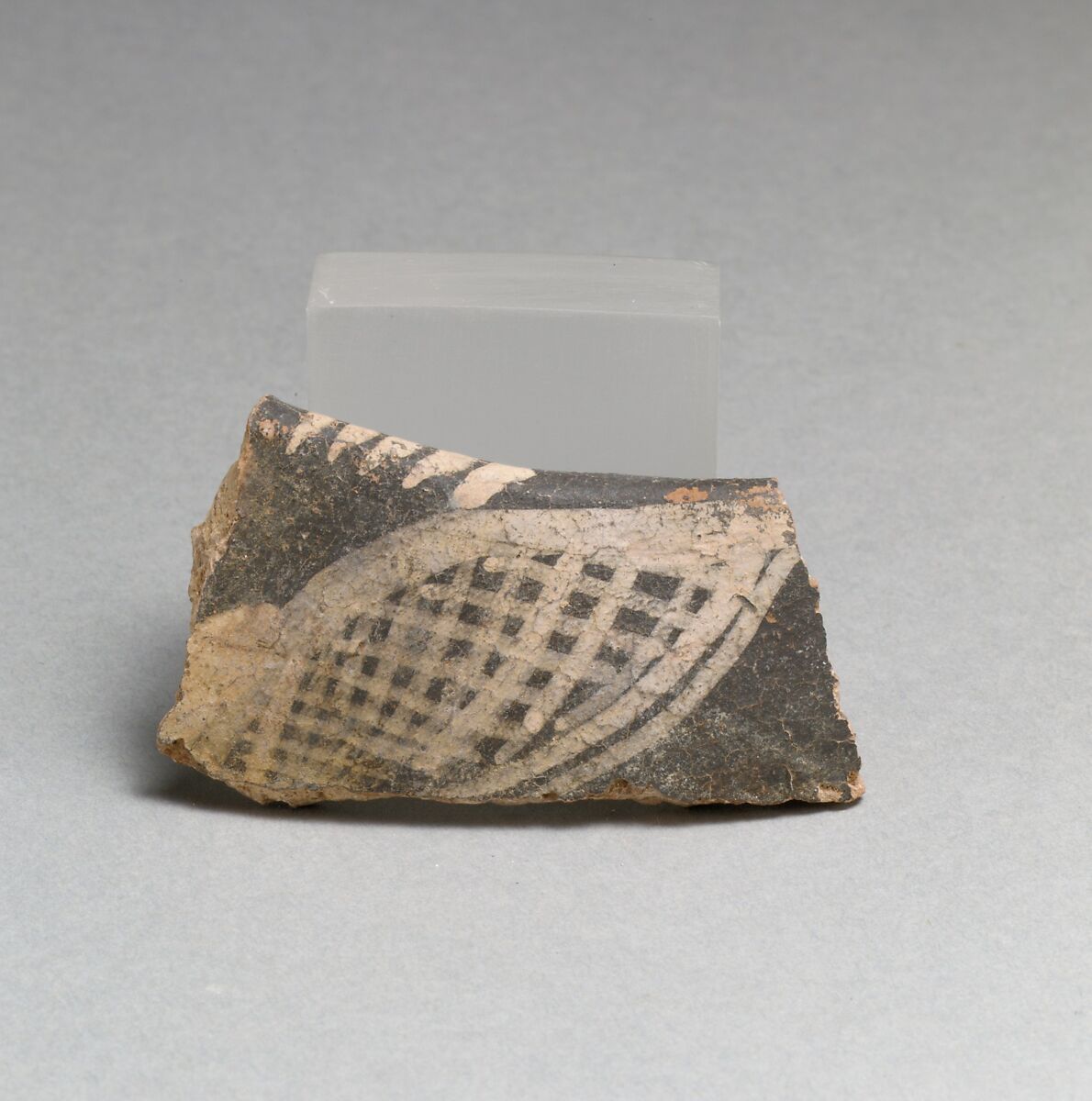 Terracotta rim fragment with hatched form, Terracotta, Minoan 