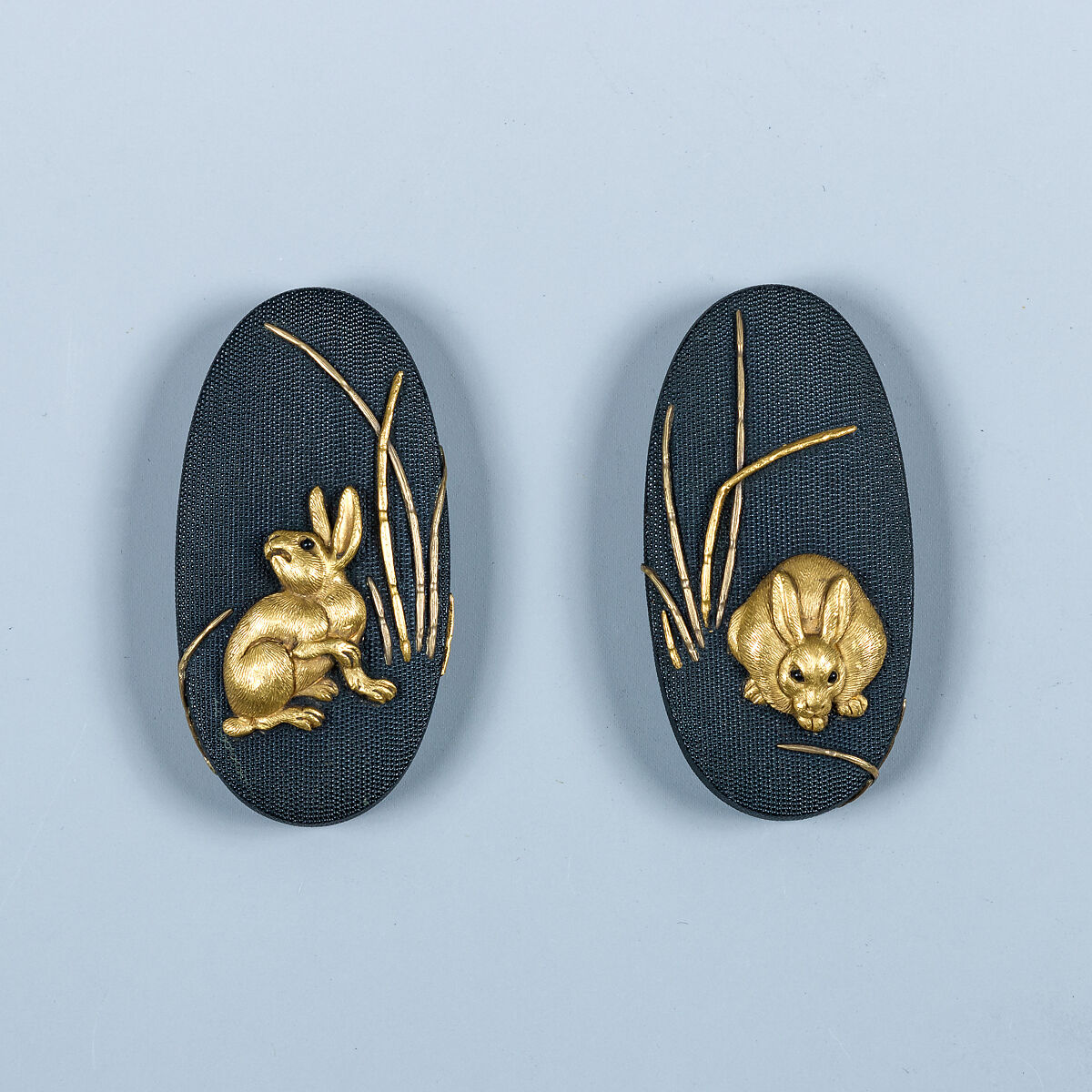 木賊兎図大小揃物 Fittings for a Pair of Swords (<i>Daishō Soroi-Mono</i>), Inscribed by 石黒政美 Ishiguro Masayoshi (Japanese, 1774–1862), Copper-gold alloy (<i>shakudō</i>), gold, silver, copper-silver alloy (<i>shibuichi</i>), copper, Japanese