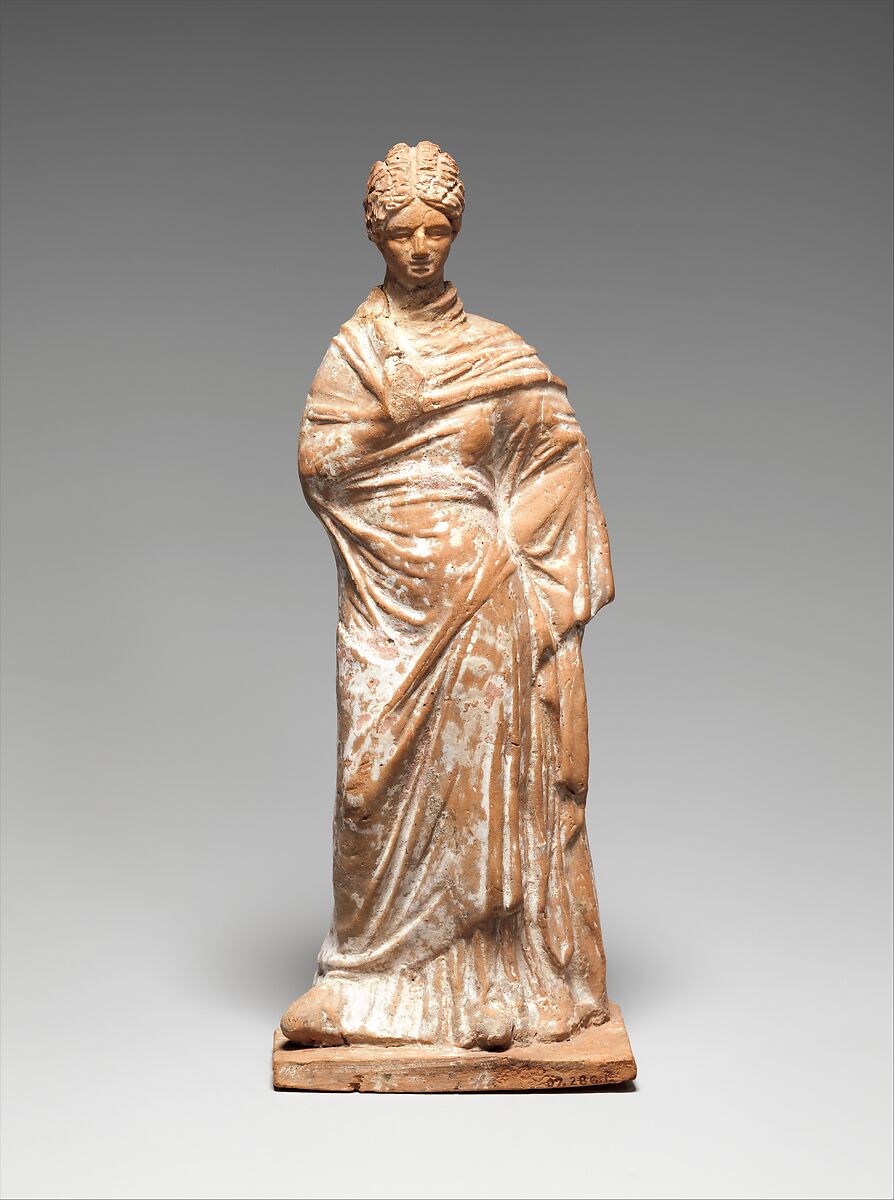 Terracotta statuette of a standing woman, Terracotta, Greek, probably Attic 