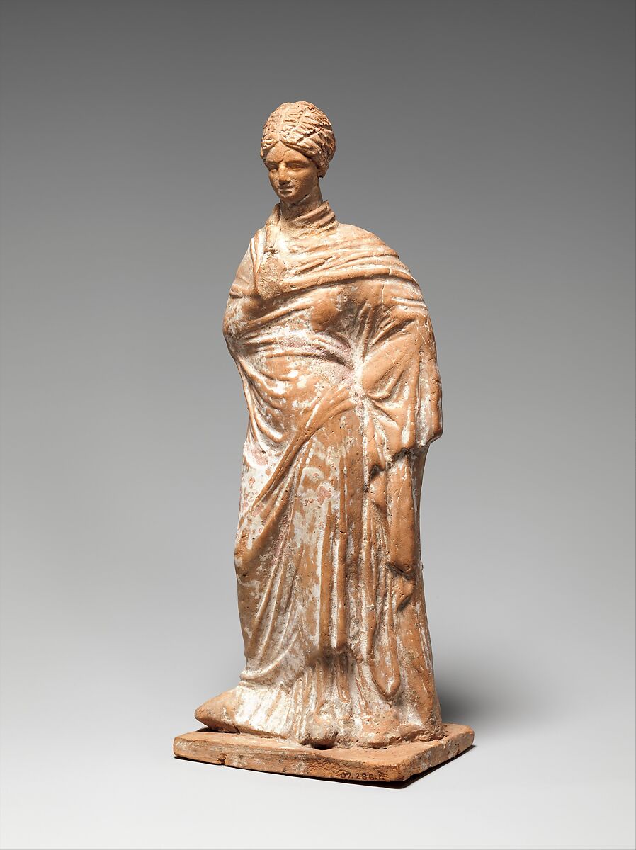 Terracotta statuette of a standing woman, Terracotta, Greek, probably Attic