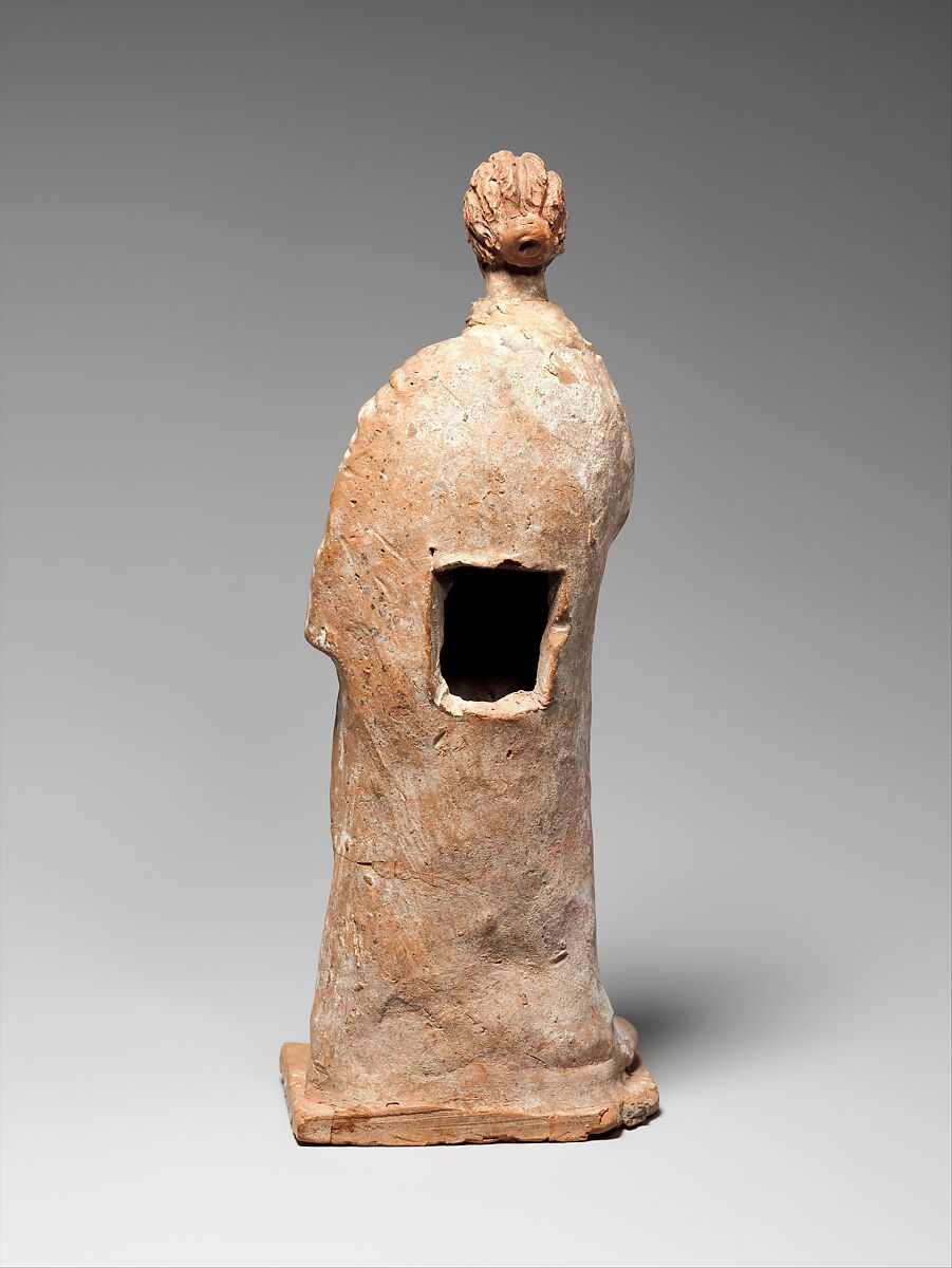 Terracotta statuette of a standing woman, Terracotta, Greek, probably Attic